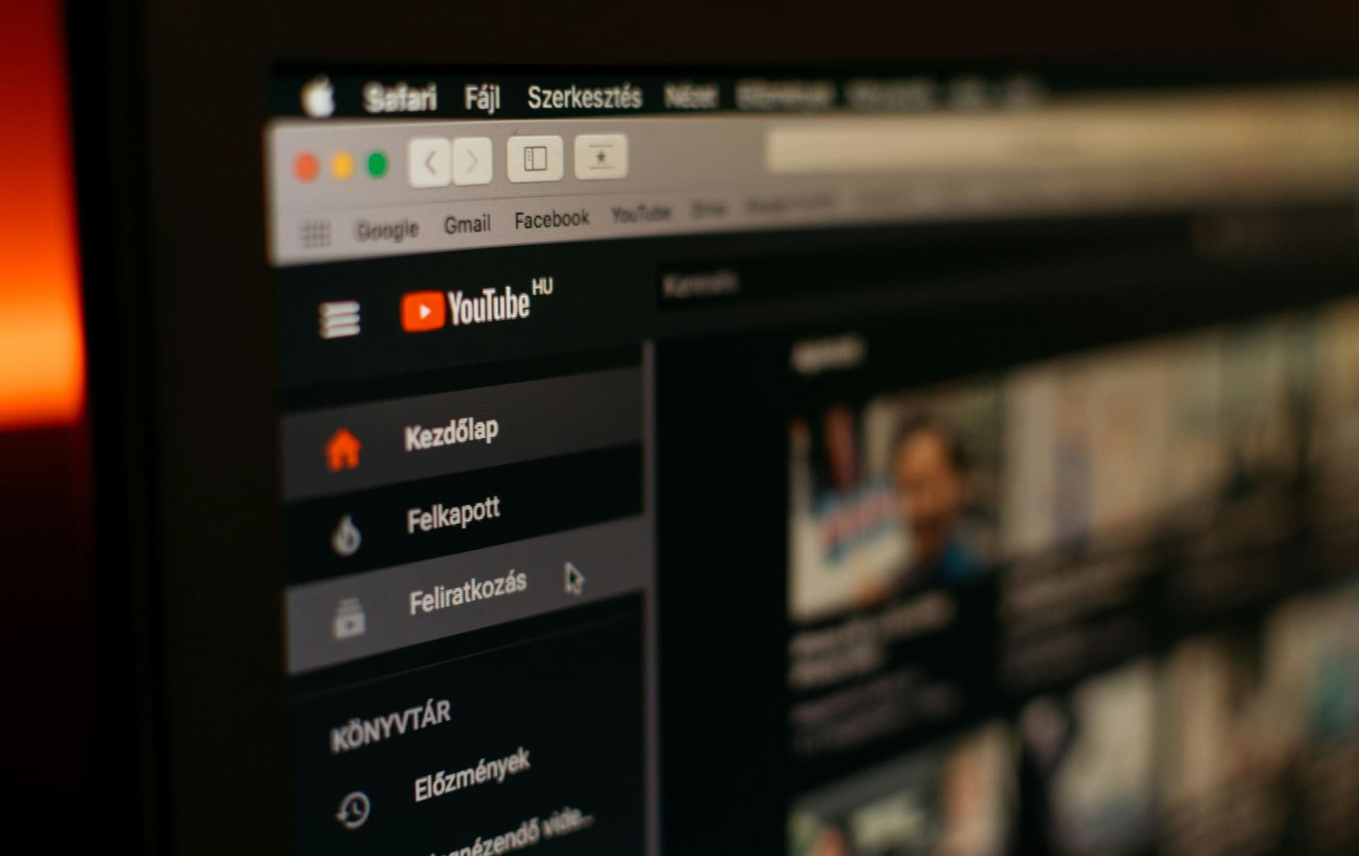 Close-up of the YouTube homepage open in Safari on a Mac screen — YouTube marketing and channel growth